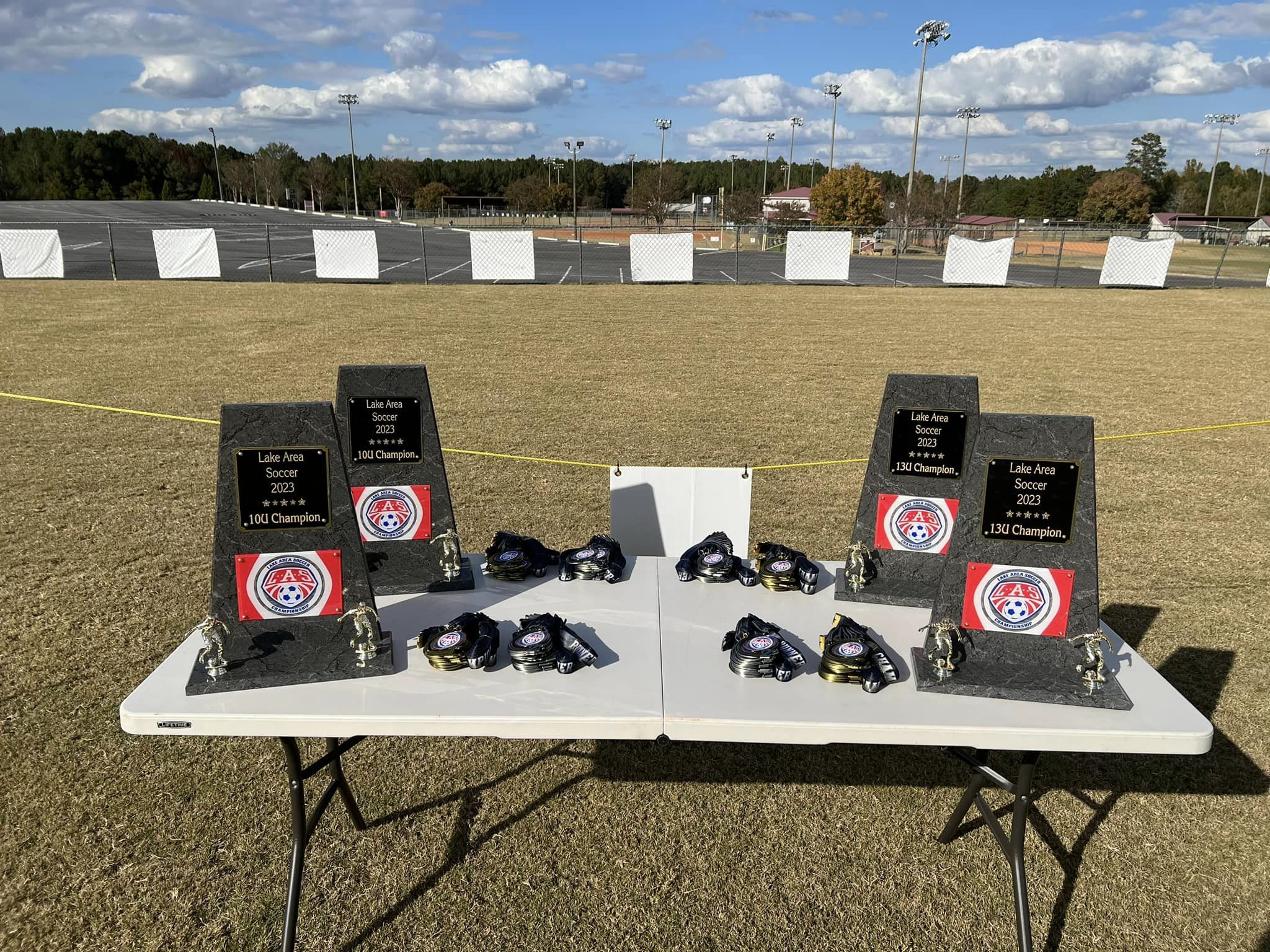 Table with soccer trophies