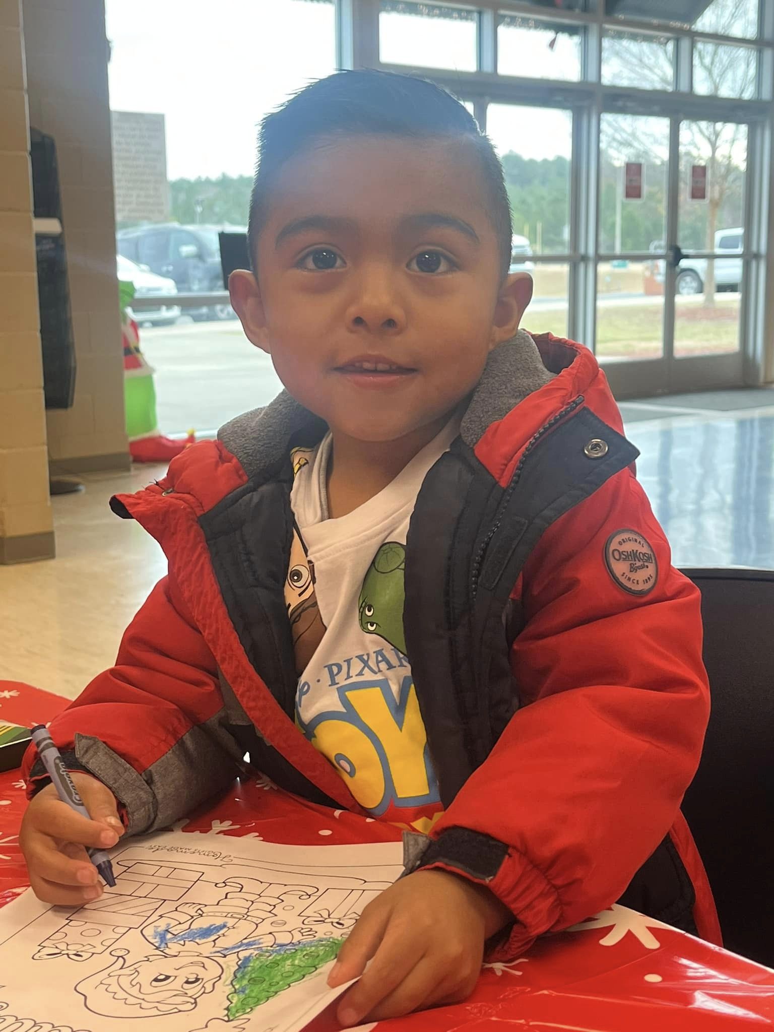 Little boy coloring a picture